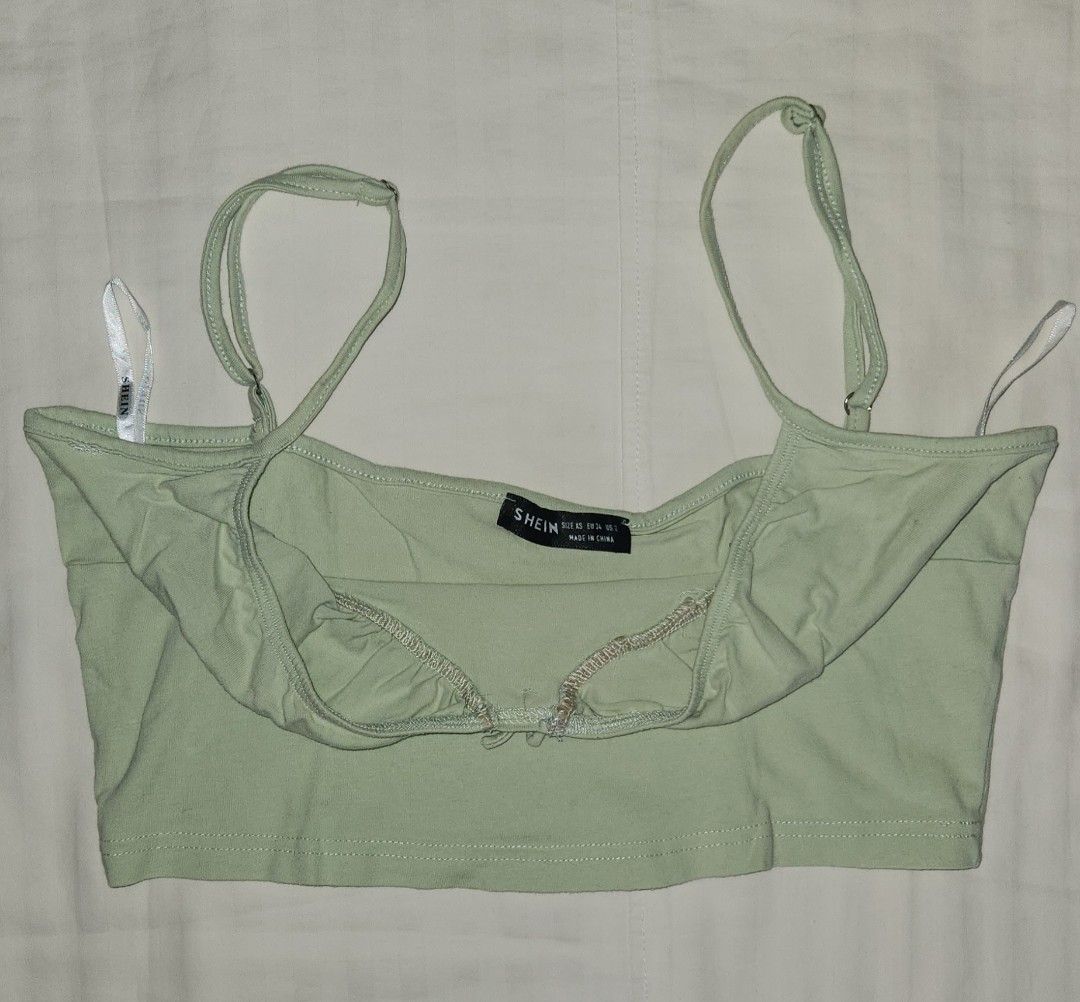 SHEIN Green Sleeveless Top (Category: Sleeveless) located in Manila. Submitted by lexymochi (Listing ID 1469619216, Image 2). Description: - Got it from a thriftshop - Never been used (too big for me) - Cropped - XS but can fit S.