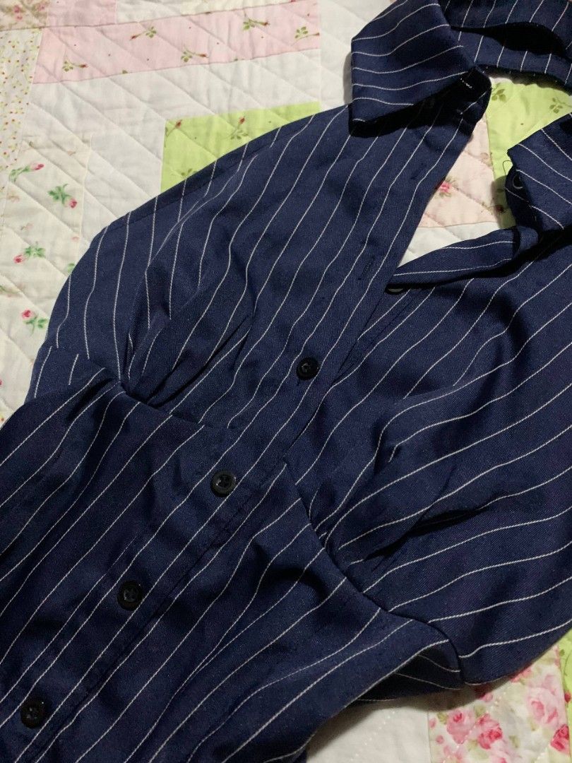 SHEIN Navy Blue Pinstripe Collared Halter Top (Category: Sleeveless) located in Paranaque City. Submitted by dayiiee (Listing ID 1469674838, Image 2). Description: Navy blue pinstripe top featuring a classic collar, button-down front, and a fitted waist for a chic and classy look. Perfect for casual wear or dressing up..