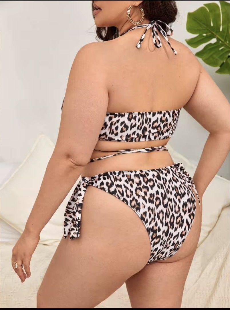 SHEIN Plus Size Leopard Wrap Halter Bikini Set Summer Beach (Category: Bikinis & Swimsuits) located in Manila. Submitted by babeboxtheory (Listing ID 1469633790, Image 3). Description: - Brand new with tags in original packaging - Bold all-over leopard print two-piece swimsuit - Halter neck top with adjustable wrap-around waist ties - Matching bottoms with side tie closures and knotted details - Comfortable stretchy fabric with a fully lined inte