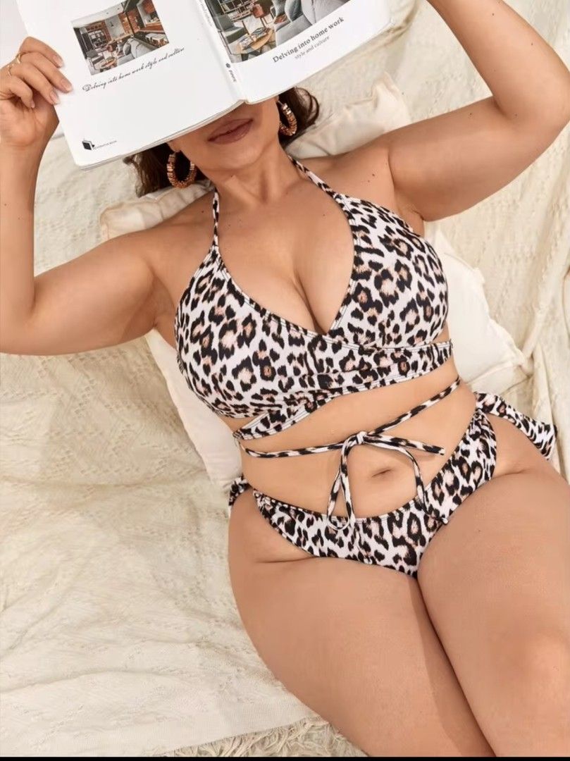 SHEIN Plus Size Leopard Wrap Halter Bikini Set Summer Beach (Category: Bikinis & Swimsuits) located in Manila. Submitted by babeboxtheory (Listing ID 1469633790, Image 1). Description: - Brand new with tags in original packaging - Bold all-over leopard print two-piece swimsuit - Halter neck top with adjustable wrap-around waist ties - Matching bottoms with side tie closures and knotted details - Comfortable stretchy fabric with a fully lined inte