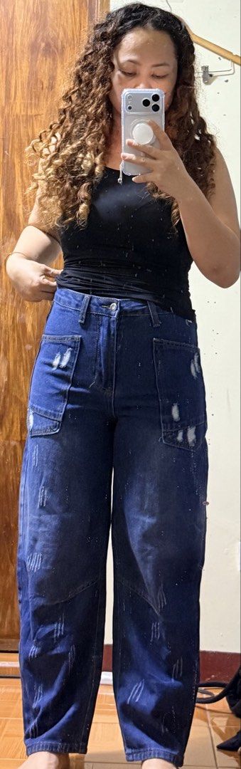SHEIN Size 26 Distressed Cargo Denim Jeans (Category: Jeans) located in Paete. Submitted by skydruemadison (Listing ID 1469685126, Image 2). Description: - Brand/Model: SHEIN Distressed Cargo Denim Jeans - Color: Dark Blue with faded whiskering - Size: 26-28 L-36 soft denim - Fit: Wide-leg style - Features: Large front patch pockets, durable cotton denim, and contrast stitching - Closure: Button and zip fly - Condition: Great casual everyday pant
