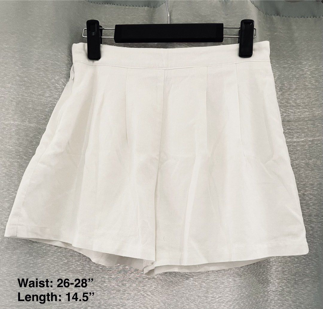 SHEIN White Pleated Shorts (Category: Shorts) located in Mandaue City. Submitted by piacatrina08 (Listing ID 1469627045, Image 1). Description: - Size: S (Fits waist 26 to 28 inches, Length 14.5 inches) - Has lining underneath.