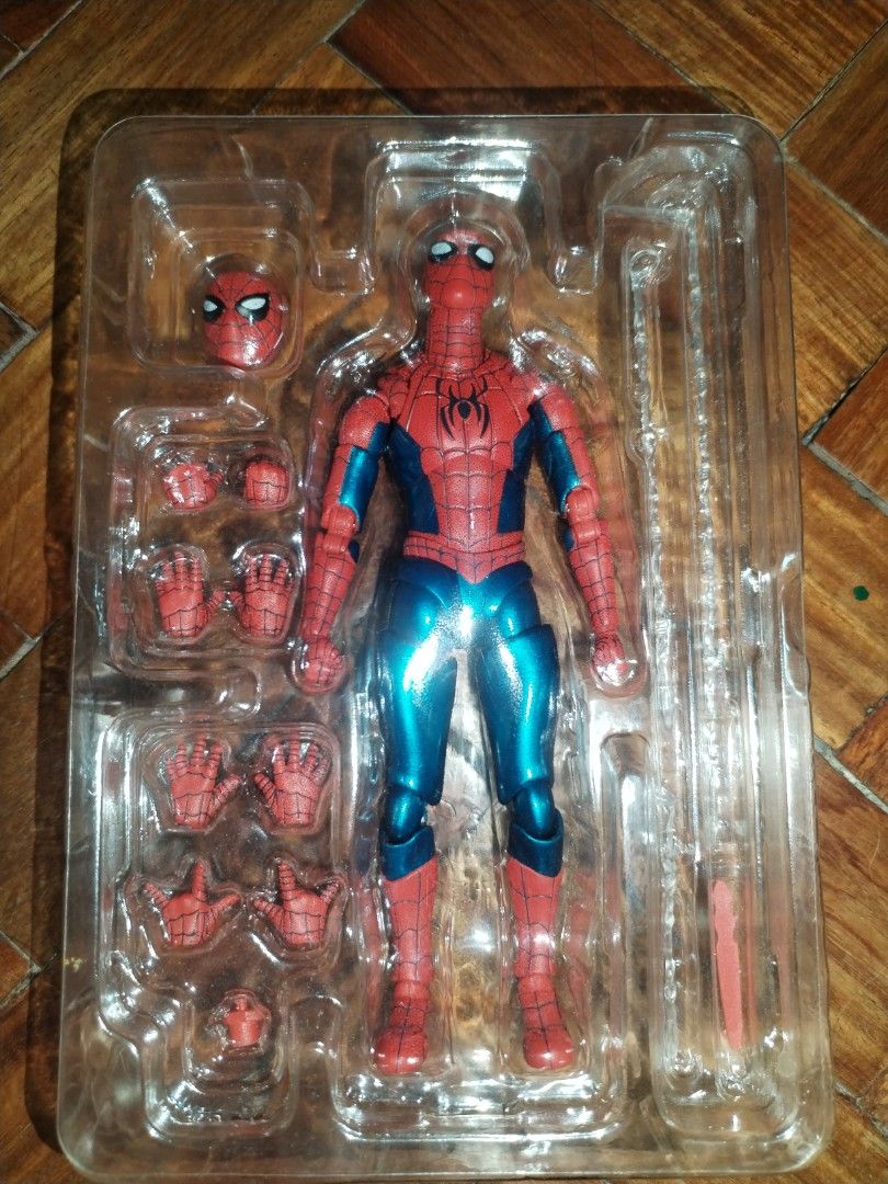 SHF Final Swing Suit Bootleg (Category: Figurines & Statues) located in Marilao. Submitted by xtiandecluttering (Listing ID 1469611083, Image 1). Description: -What you see is what you get. -only box was lost - Brand new Spider-Man action figure in blister tray packaging - Metallic blue and red suit design with classic web patterns - Includes interchangeable head sculpt for different expressions - Comes with multiple pairs of interchangeable hand