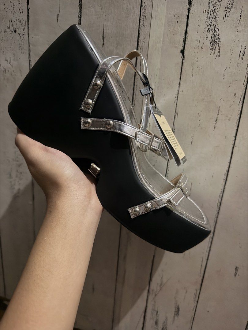 Silver Wedge Heels (Category: Heels) located in Manila. Submitted by namjoonthigh (Listing ID 1469758655, Image 3). Description: Brand: Starkela - Bnew - No issues - 4 inches high - For reference, I am size 37 wide feet and sakto siya. If size 38 na hindi wide feet keri rin. Mop: Mari/BDO Mod: Lala/Jnt.