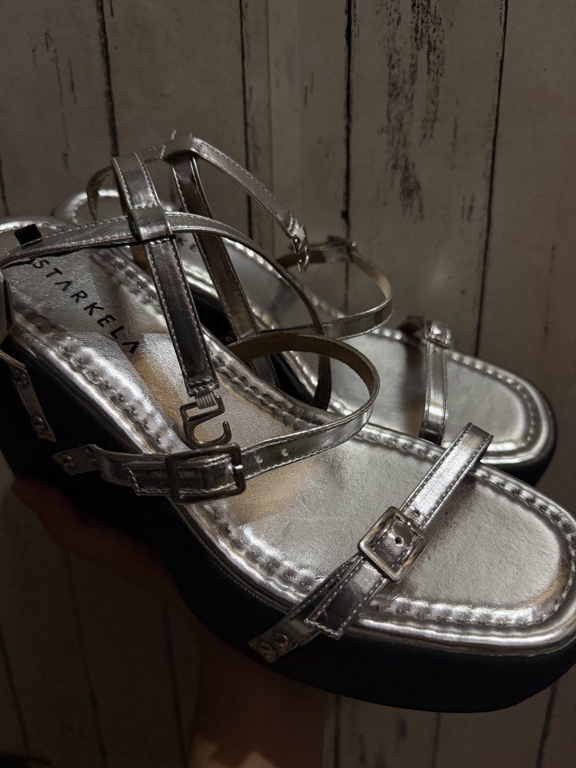 Silver Wedge Heels (Category: Heels) located in Manila. Submitted by namjoonthigh (Listing ID 1469758655, Image 2). Description: Brand: Starkela - Bnew - No issues - 4 inches high - For reference, I am size 37 wide feet and sakto siya. If size 38 na hindi wide feet keri rin. Mop: Mari/BDO Mod: Lala/Jnt.