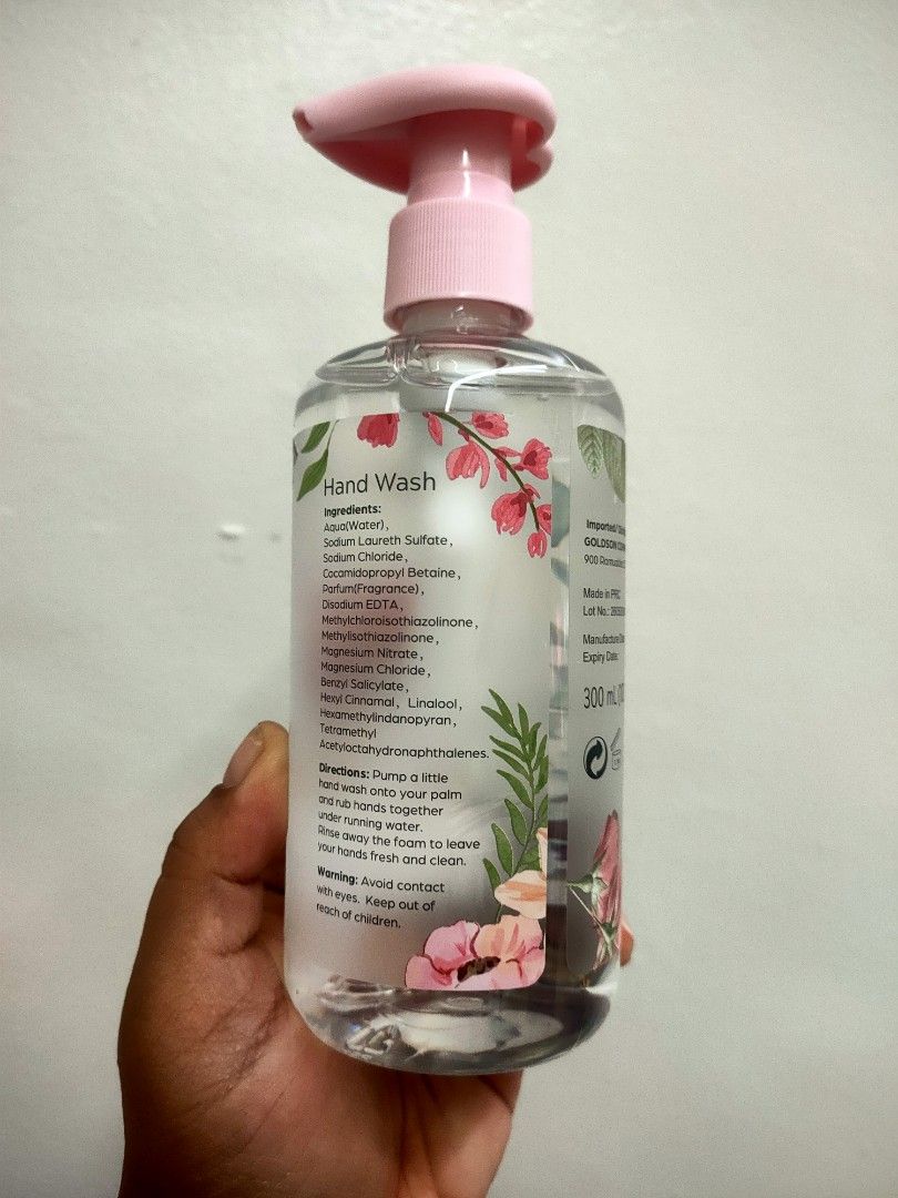 Simple Indulgence Bedazzled Hand Wash 300ml (Category: Hands & Nails) located in Bacoor. Submitted by mc_sells17 (Listing ID 1469630522, Image 2). Description: - Brand: Simple Indulgence - Product: Hand Wash - Scent: Bedazzled - Volume: 300ml - Design: Floral bottle with a pink pump top - Distributor: Goldson Company Inc. - Manufacturing Date: May 2026 - Expiry Date: May 2029 - Condition: Brand new, unopened, and 100% full.