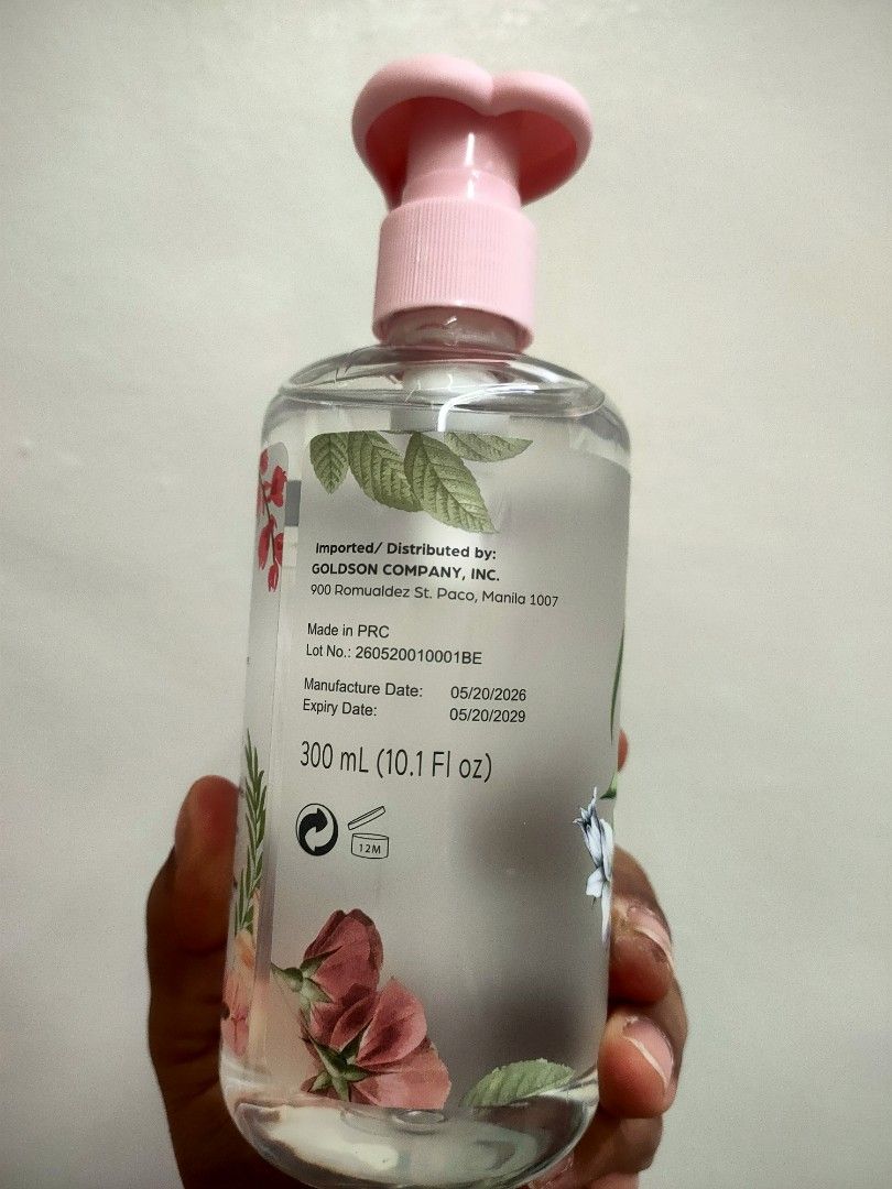 Simple Indulgence Bedazzled Hand Wash 300ml (Category: Hands & Nails) located in Bacoor. Submitted by mc_sells17 (Listing ID 1469630522, Image 3). Description: - Brand: Simple Indulgence - Product: Hand Wash - Scent: Bedazzled - Volume: 300ml - Design: Floral bottle with a pink pump top - Distributor: Goldson Company Inc. - Manufacturing Date: May 2026 - Expiry Date: May 2029 - Condition: Brand new, unopened, and 100% full.