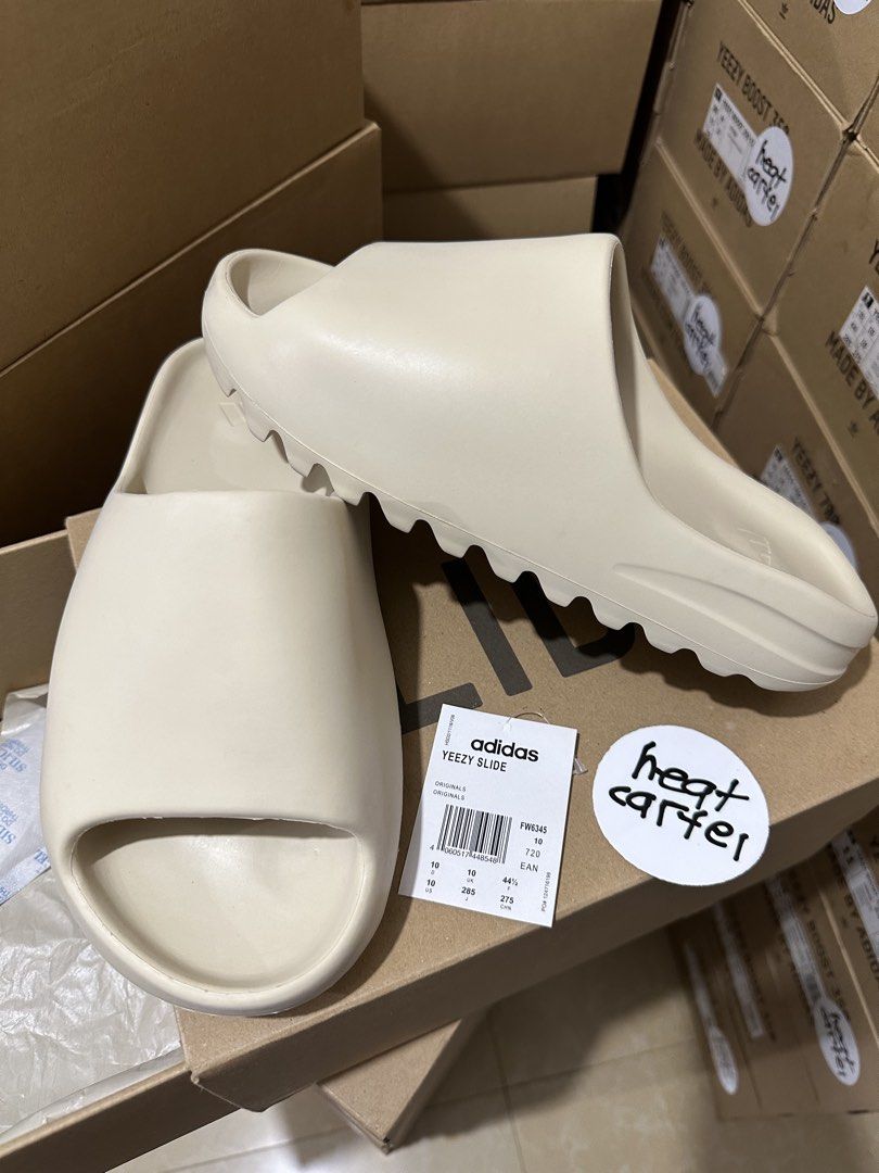 size 10 Yeezy slide bone (Category: Slippers & Slides) located in Cavite. Submitted by heatcartel_ (Listing ID 1469625678, Image 1). Description: Rare pair! COD/COP nationwide 🚚 Yeezy slide bone - size 10 brand new ₱10,500 vermosa / evia alabang / ATC meet up📍.