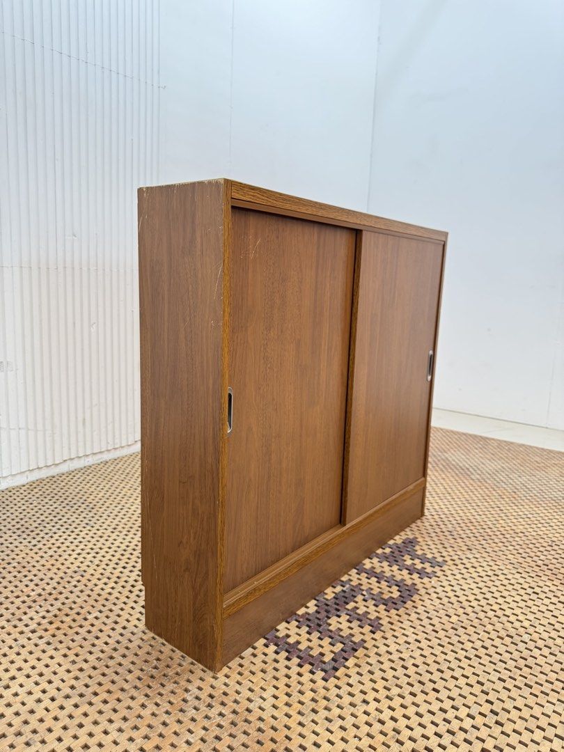 Sliding cabinet (Category: Shelves, Cabinets & Racks) located in Quezon City. Submitted by matetdevis13 (Listing ID 1469695771, Image 3). Description: Wooden Sliding Door 3-Tier Cabinet Price: 3,900 L35.5 x W8.5 x H33.5 In good condition Code JMD13-M133.