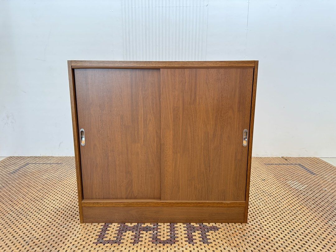 Sliding cabinet (Category: Shelves, Cabinets & Racks) located in Quezon City. Submitted by matetdevis13 (Listing ID 1469695771, Image 1). Description: Wooden Sliding Door 3-Tier Cabinet Price: 3,900 L35.5 x W8.5 x H33.5 In good condition Code JMD13-M133.