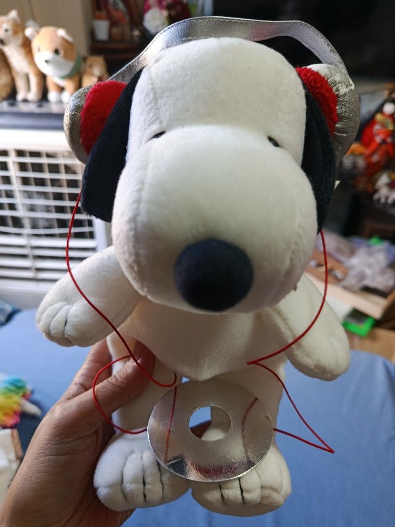 Snoopy peanuts with headphone still with tag (Category: Plushies & Soft Toys) located in Quezon City. Submitted by kristal68 (Listing ID 1469579442, Image 1). Description: slightly faded headphone.
