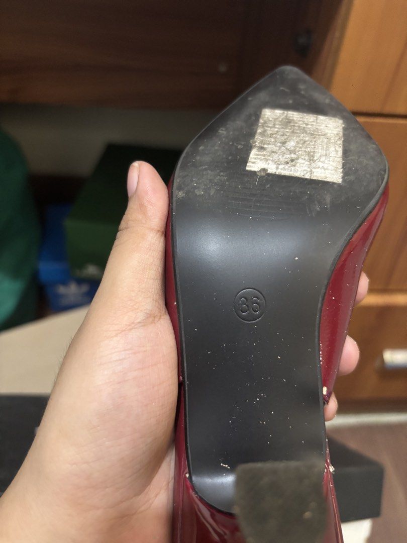 Sofab! Burgundy Slingback Heels Size 36 (Category: Heels) located in Manila. Submitted by elyxbns (Listing ID 1469618992, Image 3). Description: - Brand: Sofab! - Style: Burgundy slingback heels with pointed toe, slim heels, and adjustable buckle strap - Size: 36 (stamped on sole) - Flaws: Noticeable scuffing and peeling on the front tip of the left shoe; soles show normal wear from use - Mode of Transaction: Shipping or Meet-up available - Price