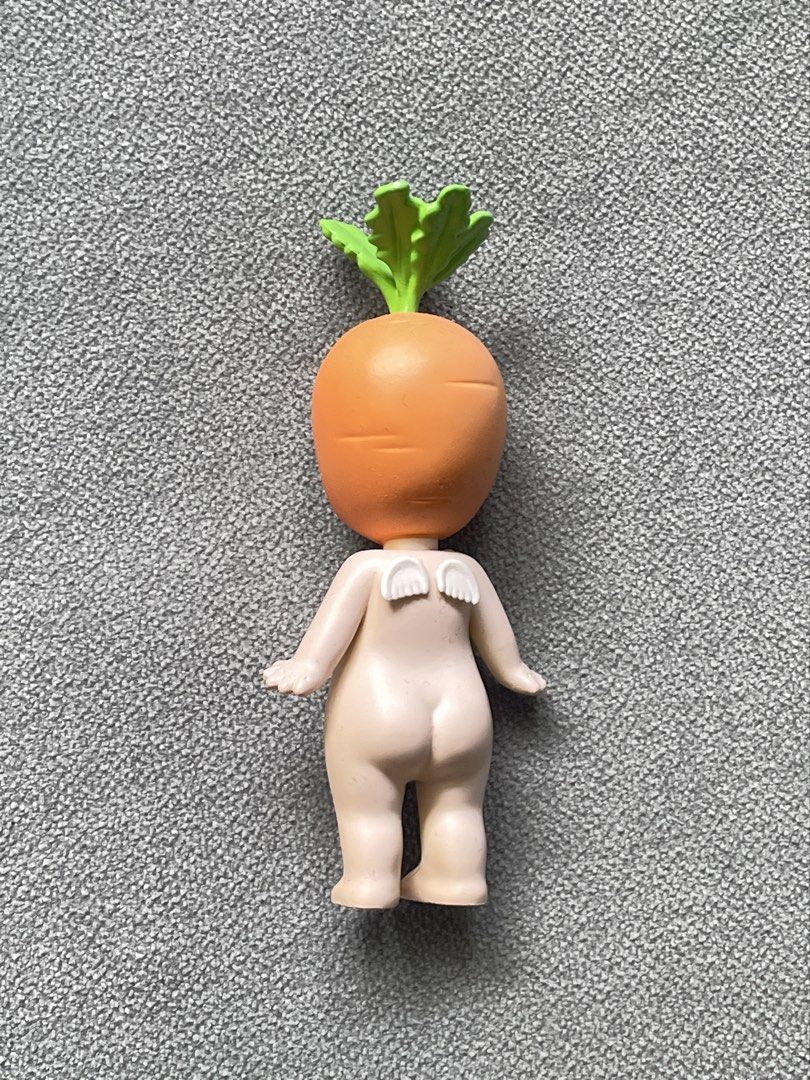 sonny angel carrot (Category: Designer & Blind Box Toys) located in Manila. Submitted by happymoon_0ae0c8 (Listing ID 1469589708, Image 2). Description: - this is carrie the carrot! - original price: 499 - negotiable - back part turned lighter as it was by the window - no box.
