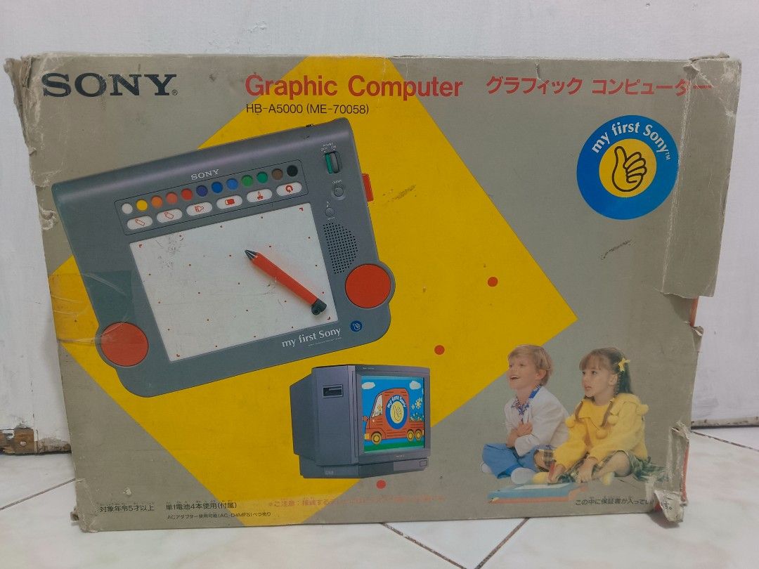 Sony My First Sony Graphic Computer HB-A5000 (Category: Desktops) located in Manila. Submitted by mateochest99469 (Listing ID 1469728982, Image 1). Description: - Untested - Vintage 1989 Sony My First Sony Graphic Computer (Model HB-A5000 / ME-70058) - Classic grey and red kids' drawing tablet that connects to a TV - Complete set includes original box, manuals, play cards, cables, and pen - Condition: Battery compartment shows some rust inside - 