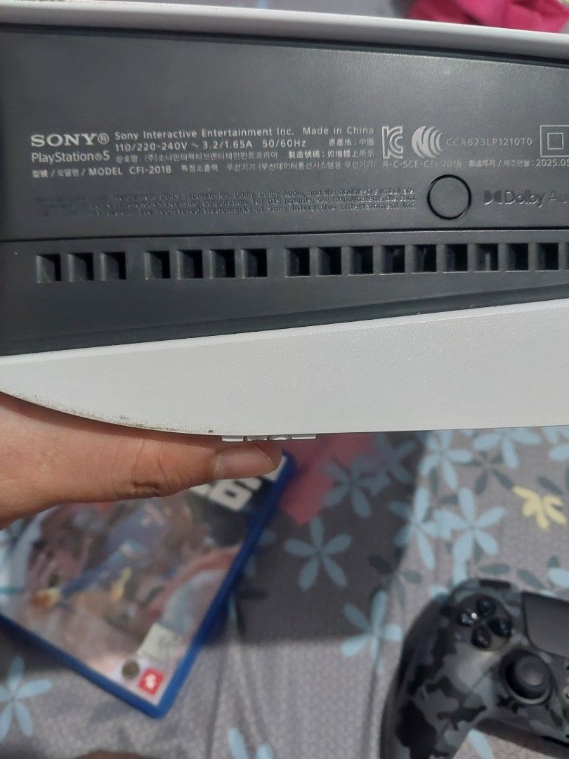 Sony PlayStation 5 Slim Console with NBA 2K26 and 2 Controllers (Category: PlayStation) located in Nasugbu. Submitted by frinceflores (Listing ID 1469609988, Image 2). Description: - PlayStation 5 Slim 1TB Console - NBA 2K26 physical game disc included - Standard white DualSense wireless controller - Extra camo-patterned DualSense controller - Complete with original retail box - Everything in the photos is included.
