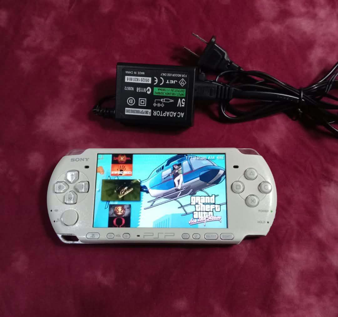Sony PSP Pearl White 3004 model v3 (Category: PlayStation) located in Quezon City. Submitted by ydna_22 (Listing ID 1469666695, Image 2). Description: Sony PlayStation Portable 3004 model v3 slim pearl white ncludes intact original battery and memory card full of games.minimal scratch due to use. All bottons crisp fully working, screen shows gameplay clearly with menu operational.Analog stick no ghost movement. Great handheld for classic gaming o