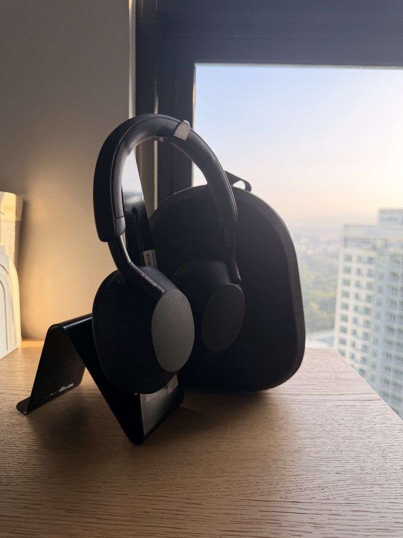 Sony WH-1000XM5 Wireless Headphones with Case (Category: Headphones & Headsets) located in Manila. Submitted by macannp (Listing ID 1469652473, Image 2). Description: - Item: Sony WH-1000XM5 Wireless Noise Cancelling Headphones - Color: Black - Condition: Good working order with normal signs of use on the matte finish. Slight Scratches on the earcup but sensor works pwrfectly fine - Inclusions: Original fabric carrying case only (headphone stand 