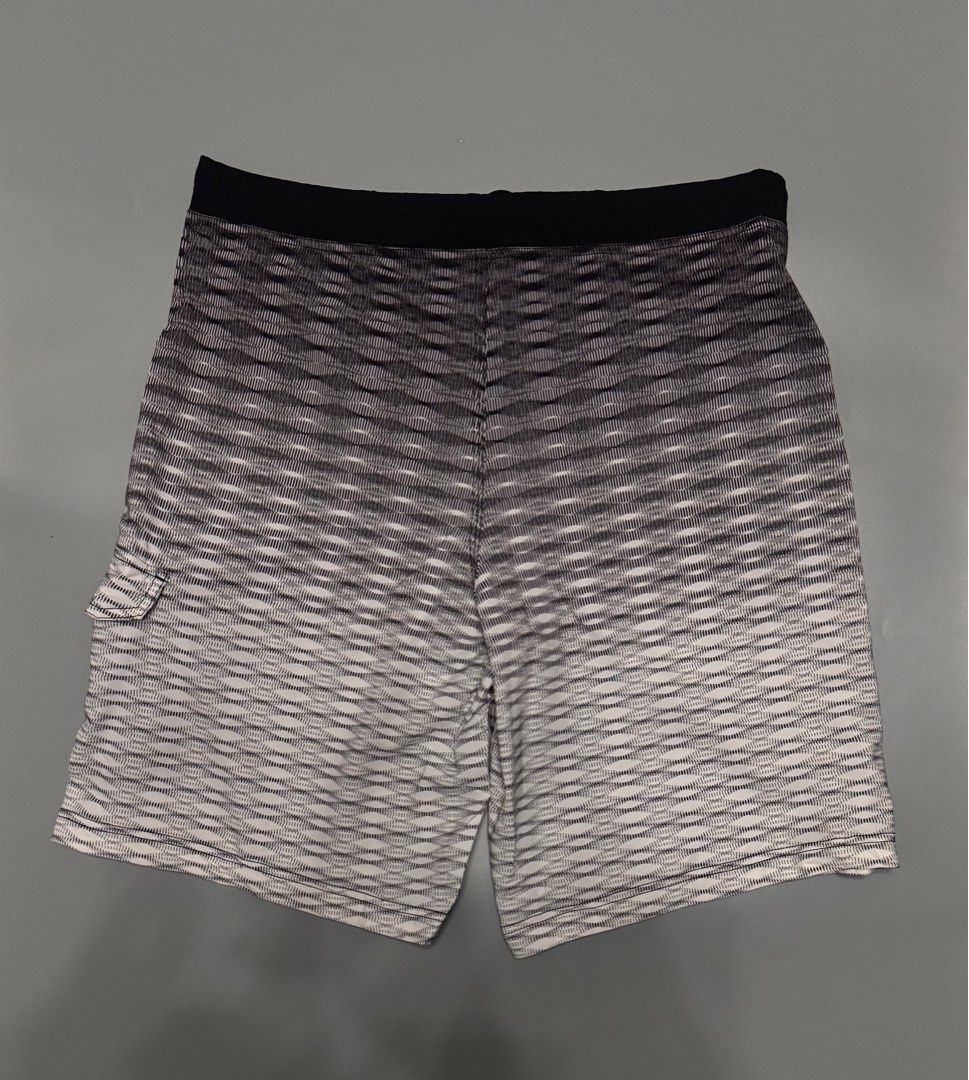 Speedo Board Shorts Men's Size 34 Black White Gradient (Category: Swim Trunks & Board Shorts) located in Alaminos. Submitted by outfitcheck.ph (Listing ID 1469698342, Image 3). Description: - Brand: Speedo - Style: Men's board shorts in a black and white gradient pattern - Size: 34 (tag inside waistband) - Features: Elastic drawstring closure, small side pocket on the right leg with Speedo logo - Fabric: Lightweight, ideal for swimming and beach 