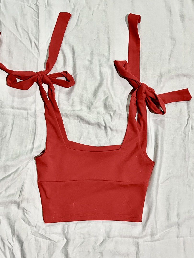 Square Neck Tie Strap Crop Top Red and White (Category: Sleeveless) located in Muntinlupa City. Submitted by _gudstuff (Listing ID 1469583107, Image 2). Description: - Bundle deal: Includes 2 pieces (Red and White) - Style: Square neck crop top with fitted silhouette - Straps: Adjustable tie shoulders - Fit: Finishes right above the waist - Material: Soft fabric with comfortable stretch - Styling: Perfect to pair with high-waisted denim or skirts