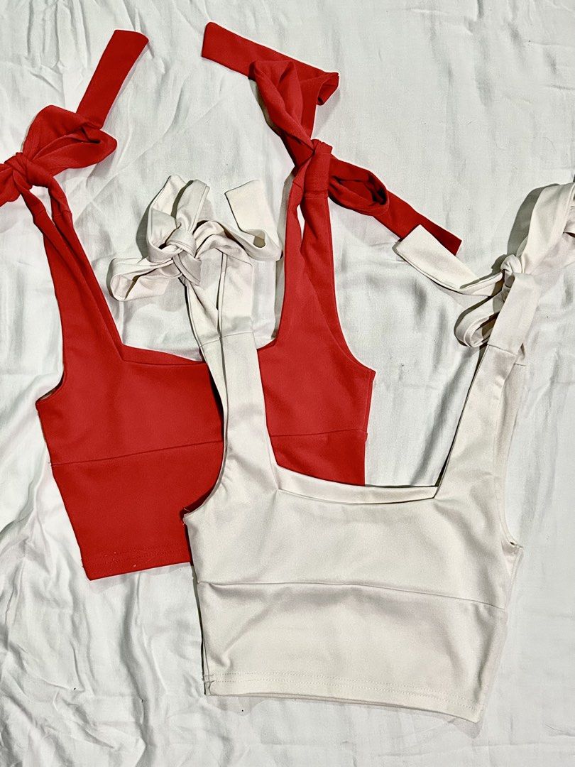 Square Neck Tie Strap Crop Top Red and White (Category: Sleeveless) located in Muntinlupa City. Submitted by _gudstuff (Listing ID 1469583107, Image 1). Description: - Bundle deal: Includes 2 pieces (Red and White) - Style: Square neck crop top with fitted silhouette - Straps: Adjustable tie shoulders - Fit: Finishes right above the waist - Material: Soft fabric with comfortable stretch - Styling: Perfect to pair with high-waisted denim or skirts