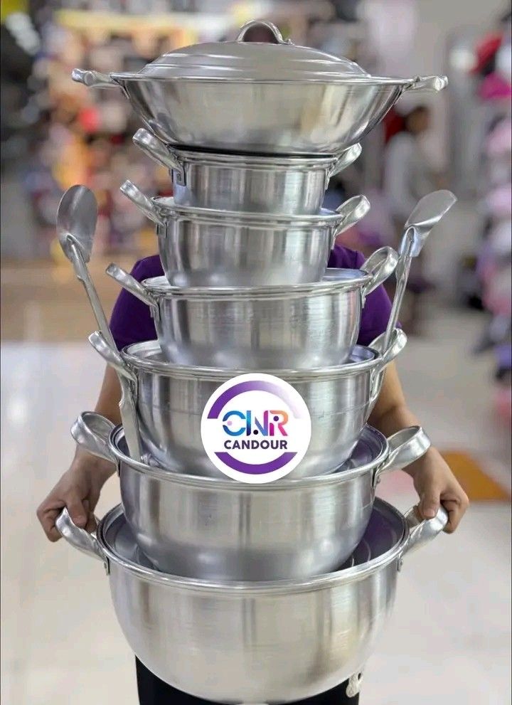 Stackable Aluminum Cooking Pot and Wok Set (Category: Cookware & Accessories) located in Quezon City. Submitted by marecel146 (Listing ID 1469618932, Image 3). Description: - Complete stackable aluminum cooking set with multiple pot sizes, matching lids, and ladles - Lightweight and heavy-duty metal construction for easy large-scale meal preparation - Space-saving nesting design allows all pieces to stack neatly into one compact tower - Ideal for
