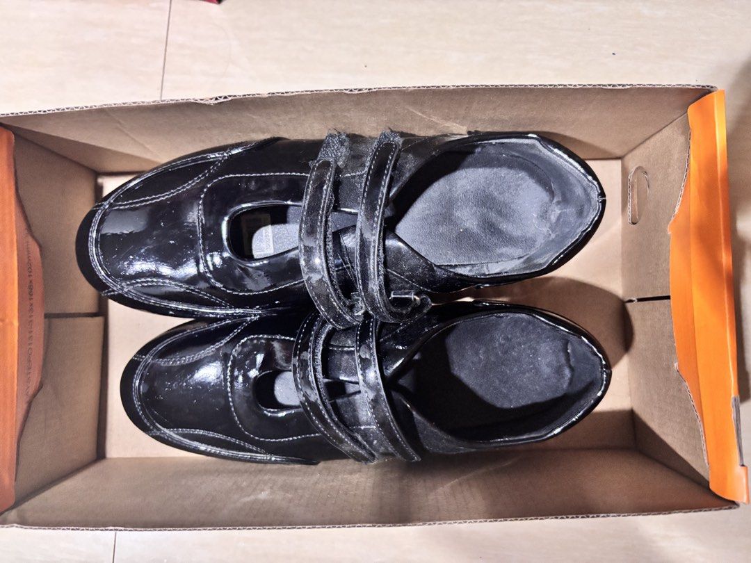 Step One Saphra Ballerina Sneaker Black Size 7 (Category: Sneakers) located in Manila. Submitted by nkkyr (Listing ID 1469685576, Image 2). Description: - Brand: Step One - Model: Saphra Ballerina Sneakers - Color: Black with patent finish - Size: Women's US 7 - Closure: Double hook-and-loop velcro straps - Condition: Brand new, never worn outside (stored in box) - Cleanliness: Immaculate insoles and outsoles - Packaging: Original orange shoebox 