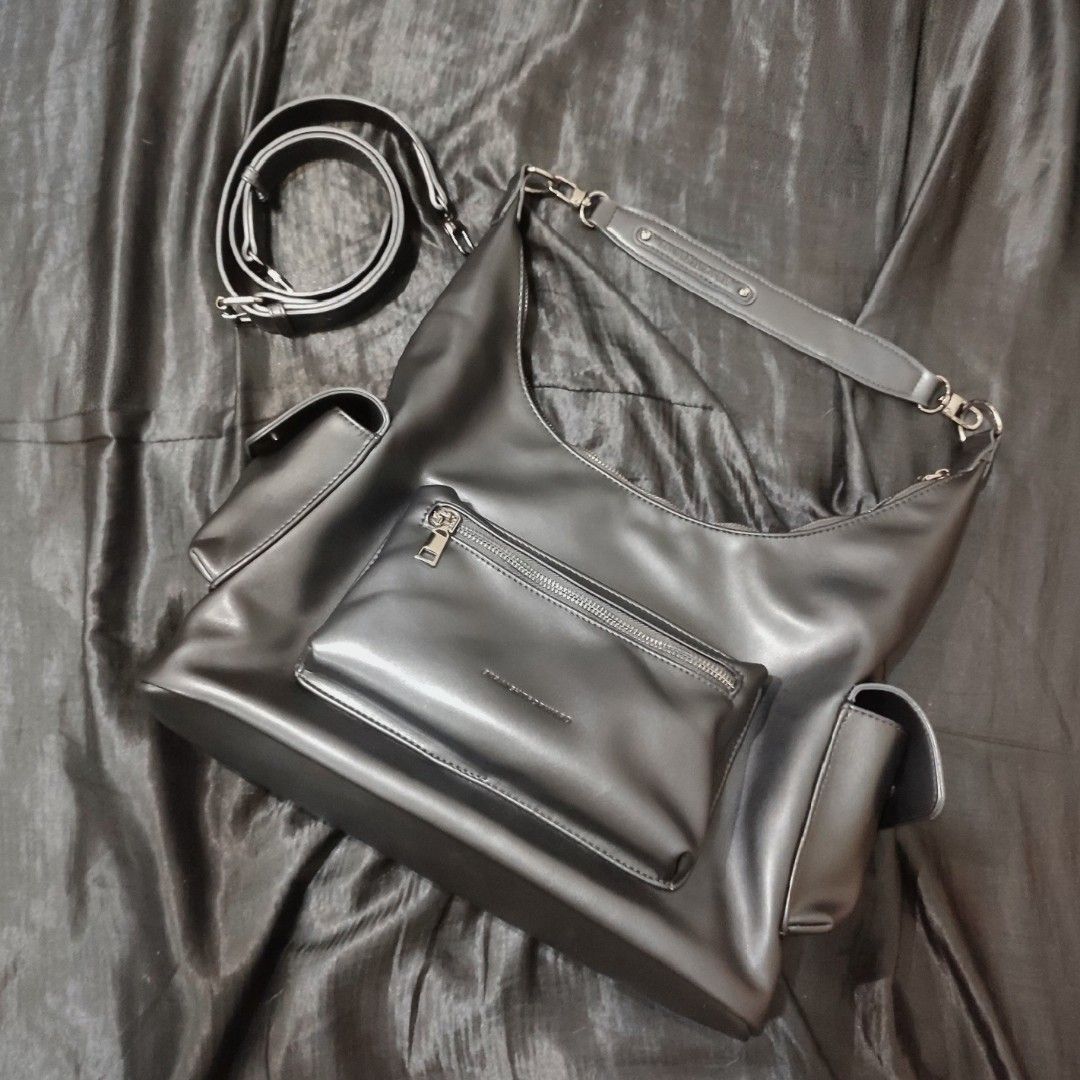 Straightforward Avery hobo sling bag (Category: Shoulder Bags) located in Santa Rosa. Submitted by acepresso (Listing ID 1469741388, Image 2). Description: • Front main zipper pocket + two side pockets with magnetic snap closures • Inner zipper pocket + key attachment + main compartment • Comes with 2 straps: shoulder strap + adjustable crossbody strap • Used only once — swipe for actual photos • Date bought: September 2026 — swipe for proof of p