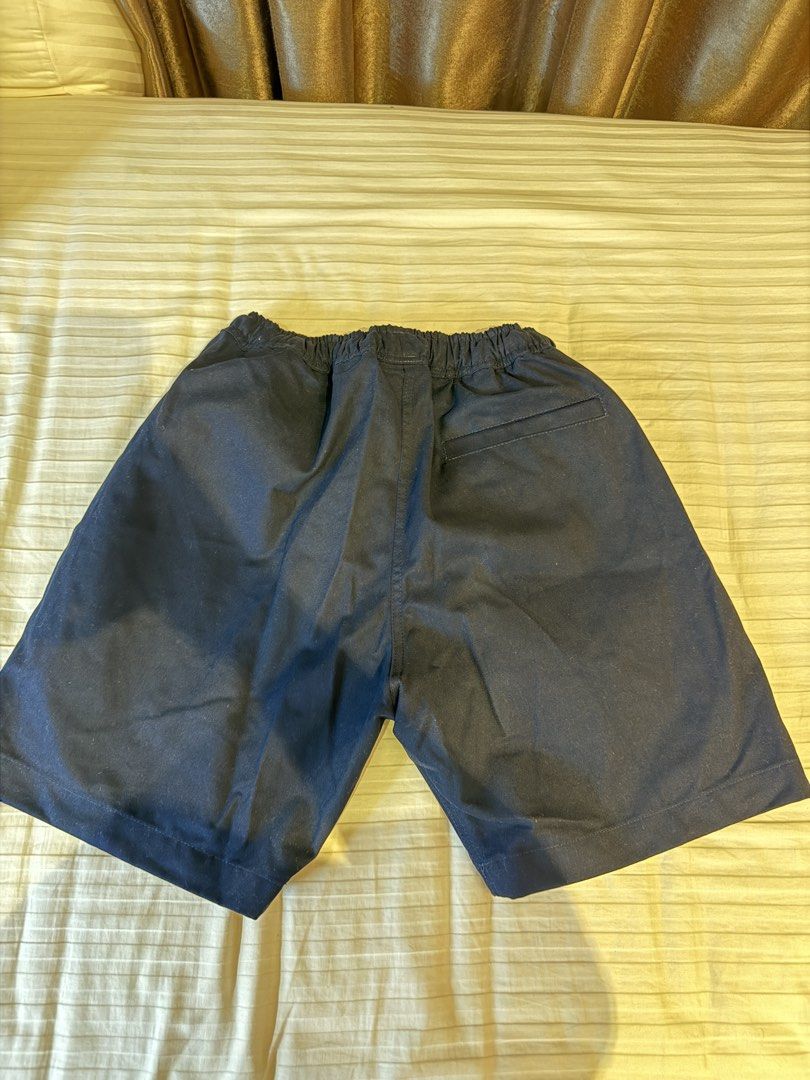 Straightforward Navy Blue Shorts Size Small (Category: Shorts) located in Muntinlupa City. Submitted by golf823 (Listing ID 1469683820, Image 2). Description: - Color: Navy Blue - Size: Small - Condition: Brand new with tags still attached - Waist: Elastic waistband with contrasting red drawstring - Pockets: Convenient side pockets and one right back pocket - Origin: Made in the Philippines - Fit: Everyday casual fit.