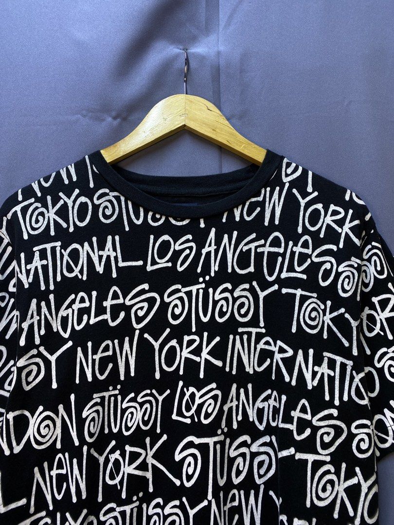 STUSSY “CITIES” AOP (Category: Tshirts & Polo Shirts ) located in Makati City. Submitted by drip.poww (Listing ID 1469734972, Image 3). Description: - Authentic Stussy - Color: Black - Size: Meduim - Dimes: 21x29 - Authentic - Excellent condition - Need wash, fresh from bale - Material: 100% Cotton Please don’t expect too much—these are thrifted (ukay) items. 😊 !!STILL NEGOTIABLE!!.