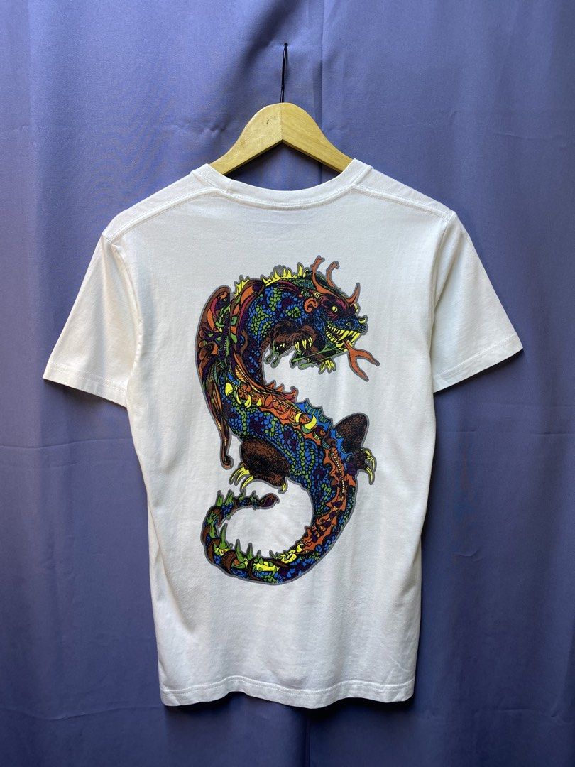 Stussy “Dragon” Tee (Category: Tshirts & Polo Shirts ) located in Makati City. Submitted by drip.poww (Listing ID 1469733716, Image 1). Description: - Authentic Stussy - Color: White - Size: Small - Dimes: 19x26 - Authentic - Excellent condition - Need wash, fresh from bale - Material: 100% Cotton Please don’t expect too much—these are thrifted (ukay) items. 😊 !!STILL NEGOTIABLE!!.