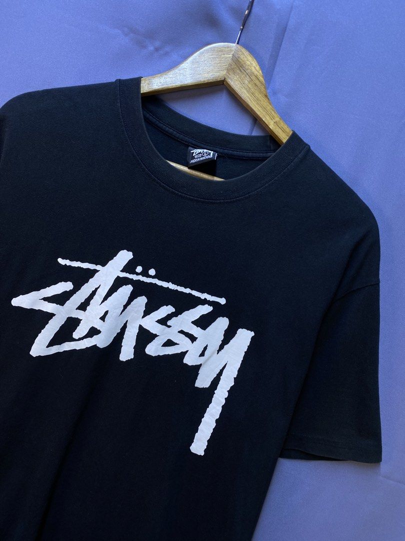 STUSSY “SURF MAN” SINGAPORE (Category: Tshirts & Polo Shirts ) located in Makati City. Submitted by drip.poww (Listing ID 1469735269, Image 3). Description: - Authentic Stussy - Color: Black - Size: Large - Dimes: 22.5x30 - Authentic - Excellent condition - Need wash, fresh from bale - Material: 100% Cotton Please don’t expect too much—these are thrifted (ukay) items. 😊 !!STILL NEGOTIABLE!!.