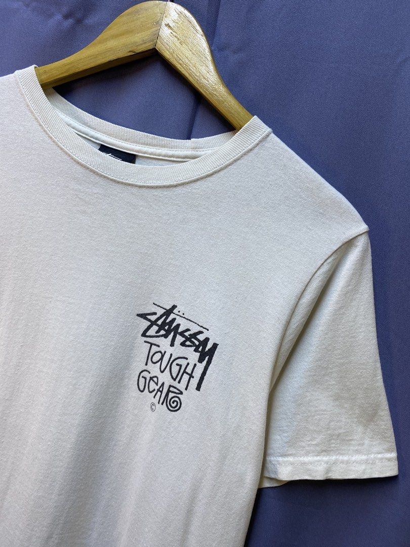 STUSSY “TOUGH GEAR” TEE (Category: Tshirts & Polo Shirts ) located in Makati City. Submitted by drip.poww (Listing ID 1469733491, Image 3). Description: - Authentic Stussy - Color: white - Size: Small - Dimes: 20x28 - Authentic - Excellent condition - Need wash, fresh from bale - Material: 100% Cotton Please don’t expect too much—these are thrifted (ukay) items. 😊 !!STILL NEGOTIABLE!!.