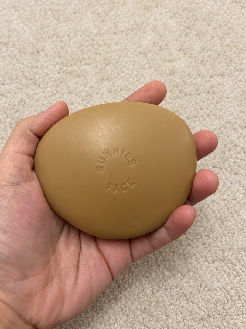 Sunnies Face Powder Blush (Disco Tech) (Category: Makeup) located in Cagayan de Oro. Submitted by thelittlehaul (Listing ID 1469648896, Image 2). Description: - Brand: Sunnies Face - Product: Powder Blush - Shade: Disco Tech - Net Weight: 8.5g - Packaging: Beige pebble-shaped compact with built-in mirror - Features a unique grooved wave pattern and bottom sticker with batch info/ingredients - Authentic and ready to ship - Great addition to your m