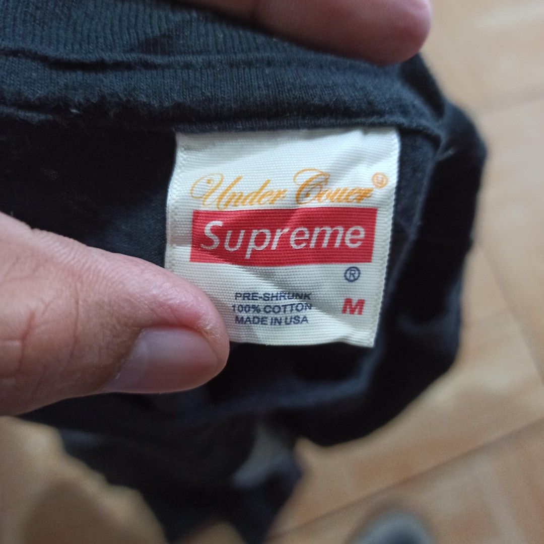 Supreme x Undercover x Public Enemy (Category: Tshirts & Polo Shirts ) located in Tagbilaran City. Submitted by delasierra39181 (Listing ID 1469584781, Image 2). Description: - Brand: Supreme x Undercover - Theme: Public Enemy (Fear of a Black Planet) - Color: Black - Size: Medium - Material: 100% pre-shrunk cotton, made in USA - Design: Front graphic print with bold yellow and red back lettering and logos - Condition: Authentic with original bra