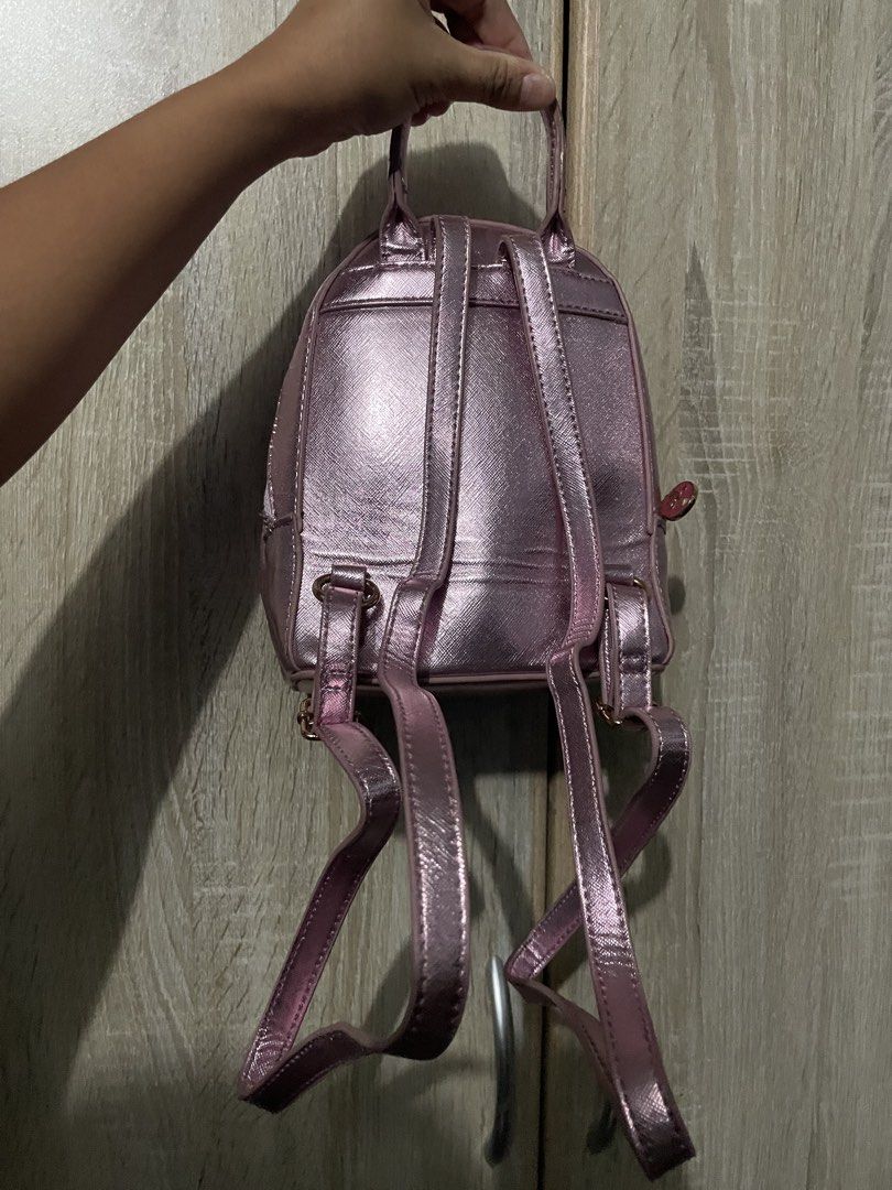Swarovski Mini Back Pack (Category: Luxury Bags & Wallets) located in San Carlos. Submitted by graciahoney (Listing ID 1469625571, Image 2). Description: .