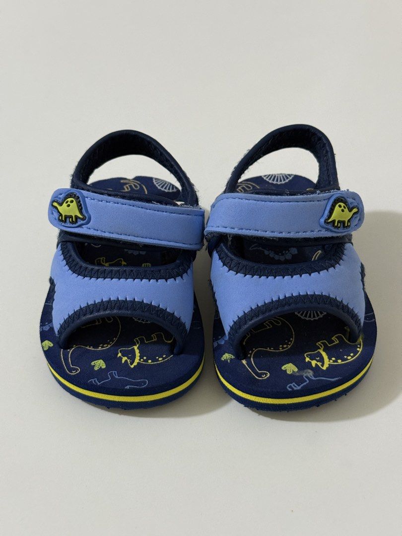 Take all!! Baby Boys Sandals Bundle (Category: Babies & Kids Fashion) located in Angeles City. Submitted by holyfabclothing (Listing ID 1469593996, Image 3). Description: - Set of 4 toddler pairs: dino water sandals, shark flip-flops, grey clogs with charms, and black clogs with red straps - Great variety for summer, pool days, or daily casual wear - Features good grip soles for safe walking and running - Selling all four pairs together as a bund
