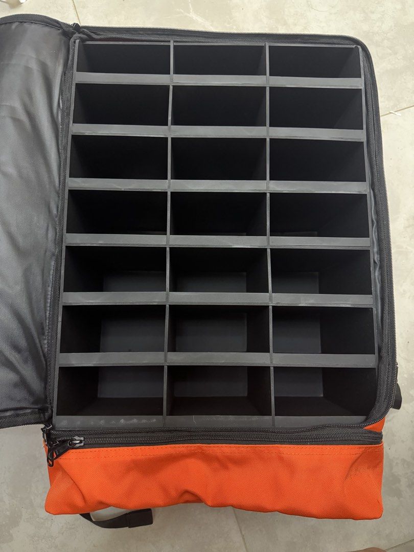 Tamiya DGTL mini 4wd 21 car slots Bag (Category: Backpacks) located in Santa Cruz. Submitted by liacong (Listing ID 1469616421, Image 2). Description: - Eye-catching bright orange Tamiya DGTL branding - Built-in vertical zipper pocket for quick access - Spacious interior with a multi-compartment plastic grid insert for ultimate organization - Ideal for model kits, hobby gear, and small parts - Made from durable, sturdy canvas material - Comfortab