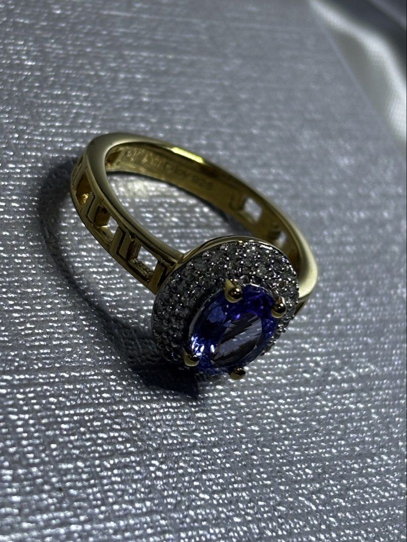 TANZANITE DOUBLE HALO RING 925 SILVER (Category: Rings) located in Manila. Submitted by bentaandco (Listing ID 1469687252, Image 2). Description: 💙 TANZANITE DOUBLE HALO RING 💛 A stunning violet-blue center stone surrounded by a dazzling double halo of white zircon, finished with a beautiful yellow gold vermeil setting. ✨ Genuine 925 Sterling Silver base ✨ Yellow Gold Vermeil finish ✨ Tanzanite center stone ✨ White Zircon accents ✨ Total Gemsto