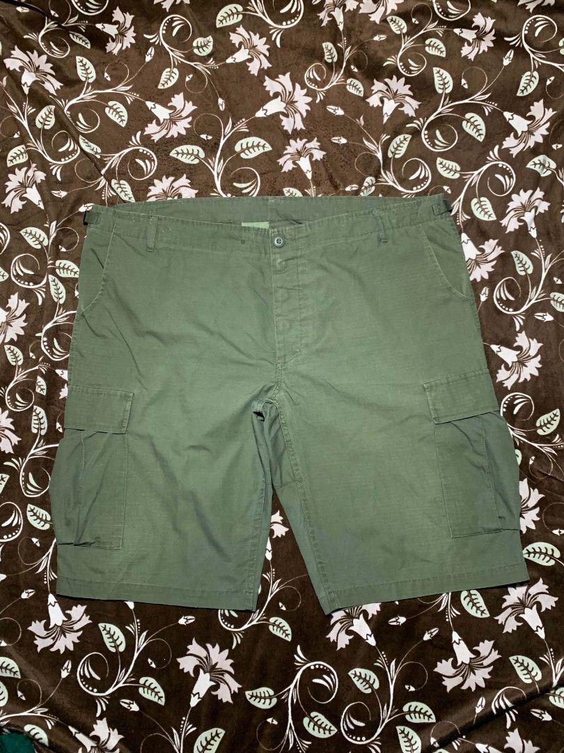 TEESAR Military Ripstop Combat Cargo Shorts (Category: Shorts) located in Bislig. Submitted by rndm_stff1 (Listing ID 1469615334, Image 2). Description: military-spec combat shorts from Teesar Inc. / Sturm Handels GmbH. Crafted from durable 100% cotton ripstop fabric in classic olive green. Features adjustable waist side tabs, button fly, spacious side cargo pockets, and button-flap rear pockets. Built for rugged utility, tactical wear, and outdo