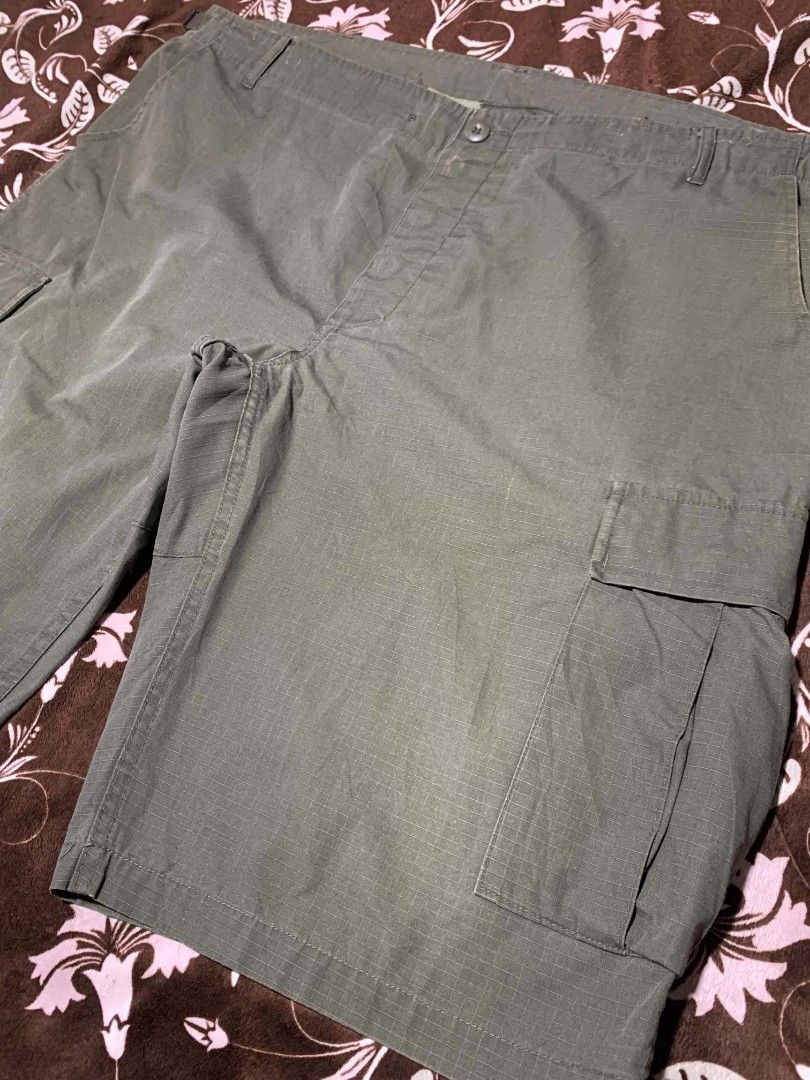 TEESAR Military Ripstop Combat Cargo Shorts (Category: Shorts) located in Bislig. Submitted by rndm_stff1 (Listing ID 1469615334, Image 3). Description: military-spec combat shorts from Teesar Inc. / Sturm Handels GmbH. Crafted from durable 100% cotton ripstop fabric in classic olive green. Features adjustable waist side tabs, button fly, spacious side cargo pockets, and button-flap rear pockets. Built for rugged utility, tactical wear, and outdo