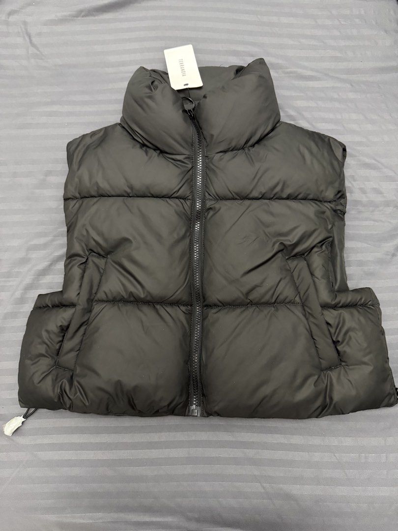 Terranova Black Puffer Vest Size S (Category: Sleeveless) located in Manila. Submitted by karminareyes123 (Listing ID 1469680407, Image 1). Description: - Brand: Terranova - Item: Black Puffer Vest - Size: Small - Condition: Brand new with original tags (BNWT), clean and unworn - Design: Quilted puffer with high collar and front zipper closure - Features: Convenient side pockets - Perfect for: Cold weather layering.