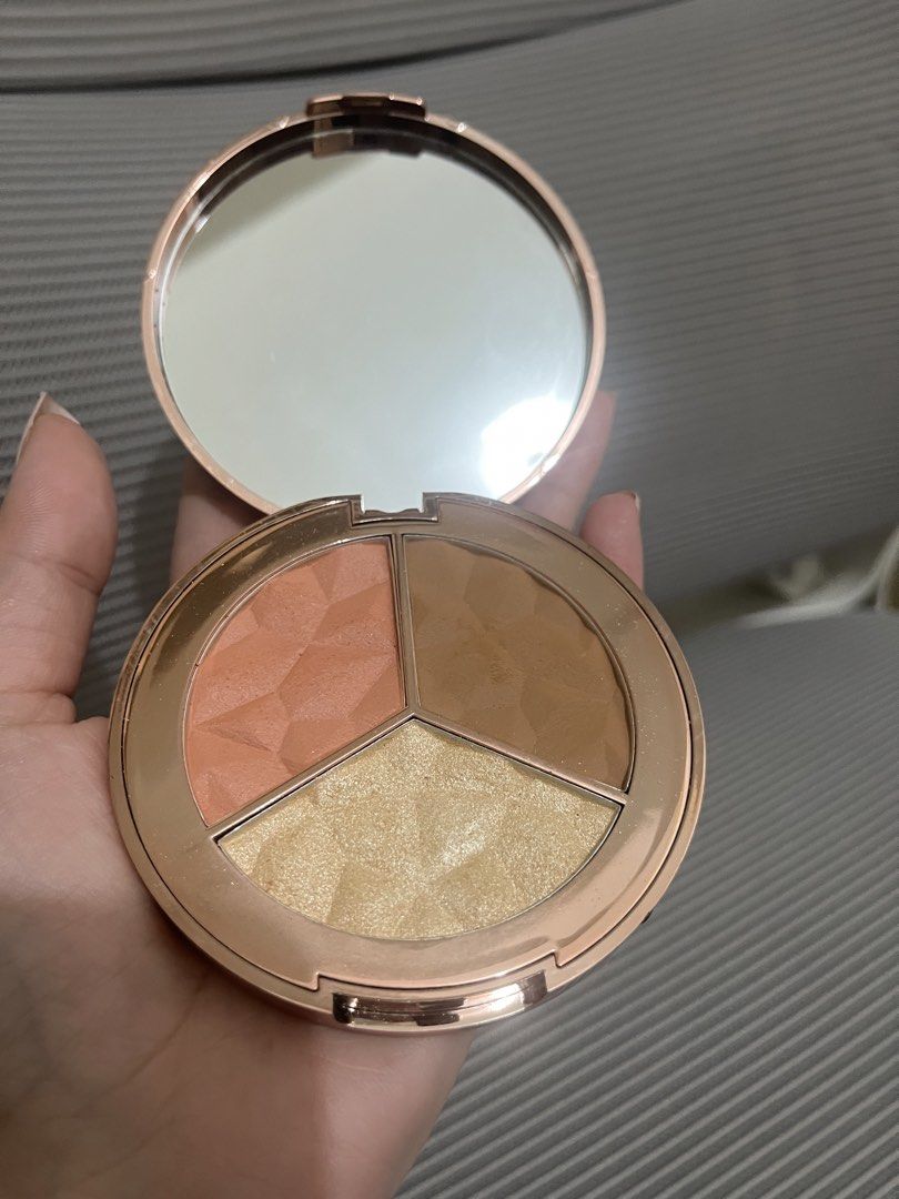 Teviant Love Letter Face Palette (Category: Makeup) located in Manila. Submitted by goddesssy (Listing ID 1469167761, Image 2). Description: - Brand: Téviant - Item: Love Letter Face Palette - Shades included: Salmon blush, light tan brontour, and champagne highlighter - Packaging: Rose gold compact with a floral design and built-in mirror - Features: All-in-one palette for contouring, blushing, and highlighting - Condition: Brand new / Excellent