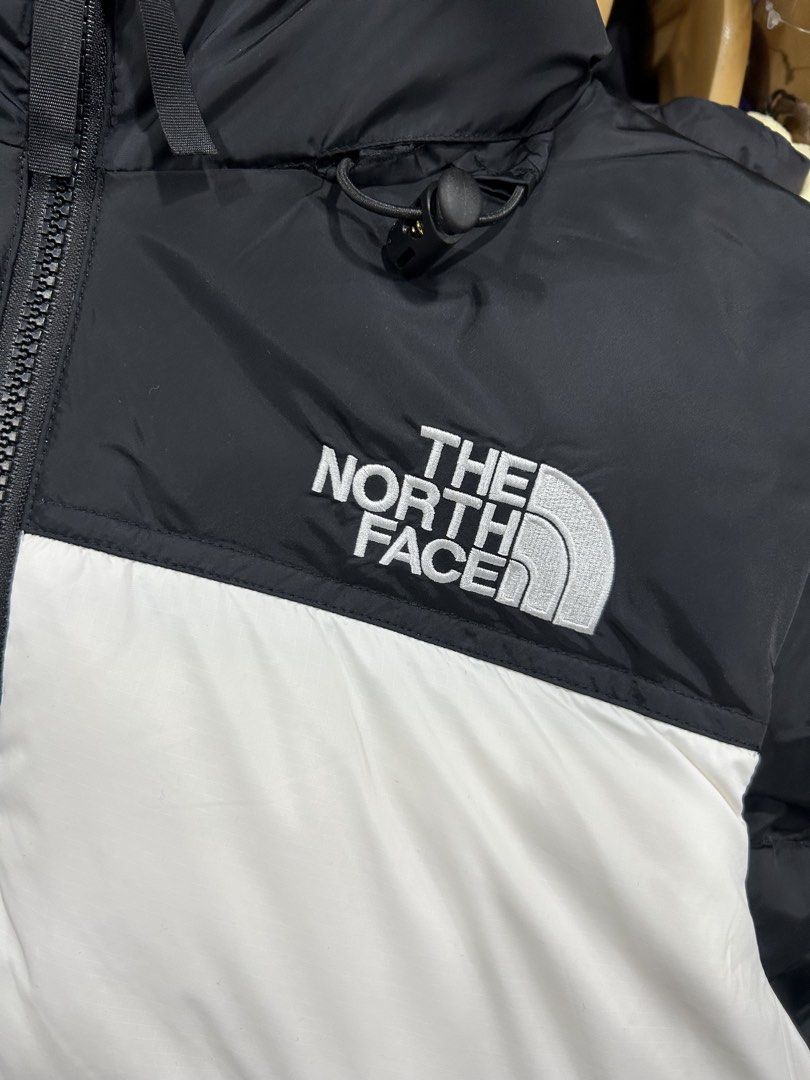 The North Face 700 Nuptse Puffer Jacket Black White (Category: Coats, Jackets and Outerwear) located in Manila. Submitted by bodegabodega (Listing ID 1469710695, Image 2). Description: - Brand: The North Face - Model: 700 Nuptse Jacket with Hood - Colorway: Black and White - Condition: Brand new, unworn with original tags attached - Insulation: Premium down for maximum warmth - Details: Classic TNF chest and sleeve embroidery - Guaranteed authent