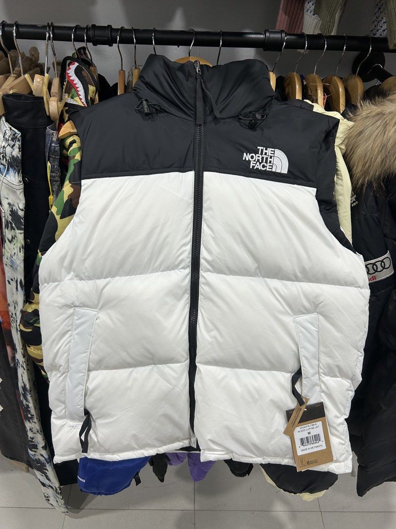The North Face 700 Nuptse Puffer Jacket Black White (Category: Coats, Jackets and Outerwear) located in Manila. Submitted by bodegabodega (Listing ID 1469710695, Image 1). Description: - Brand: The North Face - Model: 700 Nuptse Jacket with Hood - Colorway: Black and White - Condition: Brand new, unworn with original tags attached - Insulation: Premium down for maximum warmth - Details: Classic TNF chest and sleeve embroidery - Guaranteed authent