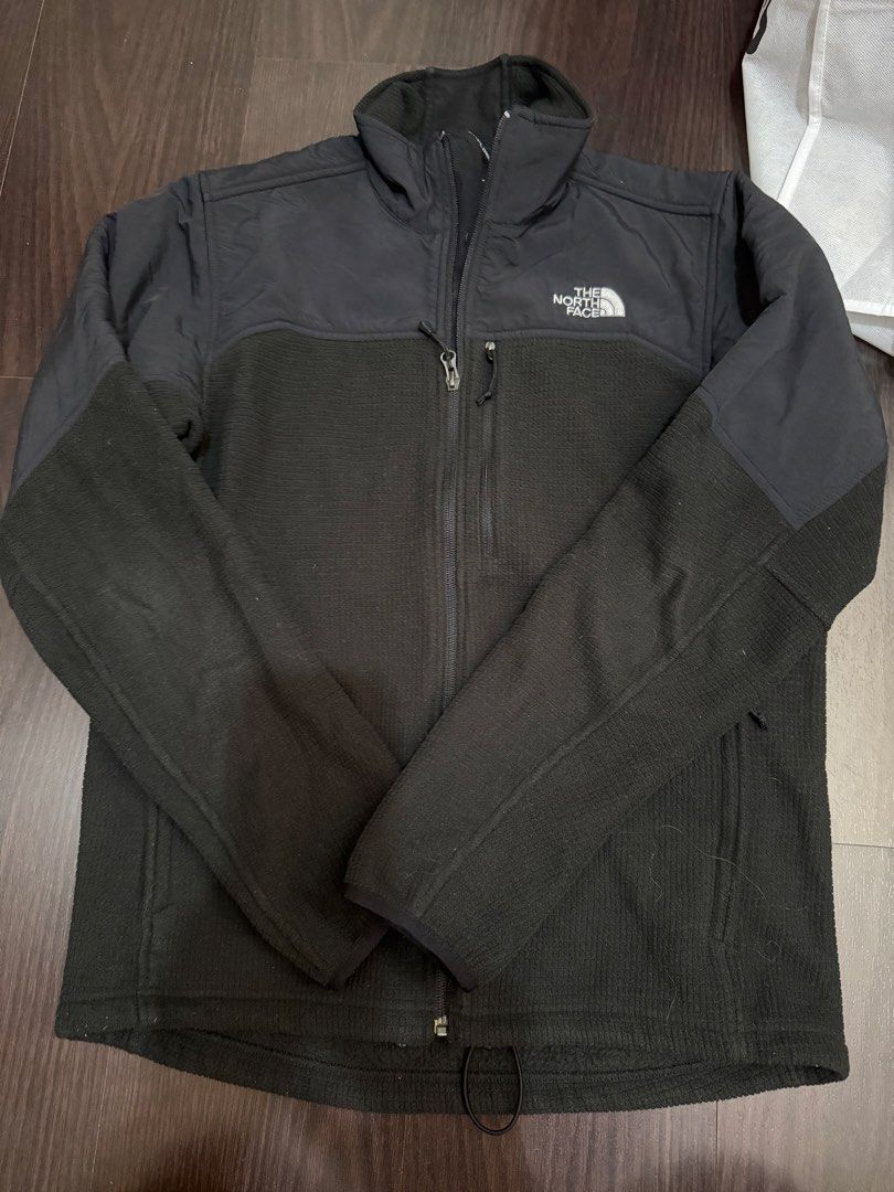 The North Face Black Fleece Jacket (Category: Coats, Jackets and Outerwear) located in Las Pinas. Submitted by nickelcloset (Listing ID 1469601349, Image 1). Description: - Brand: The North Face - Condition: Excellent / Pre-loved (ready to wear) - Size: Men's S/M - Color: Classic Black - Material: Warm grid fleece body with weather-resistant woven nylon panels on chest, shoulders, and back - Pockets: 1 front zippered chest pocket + 2 secure lower