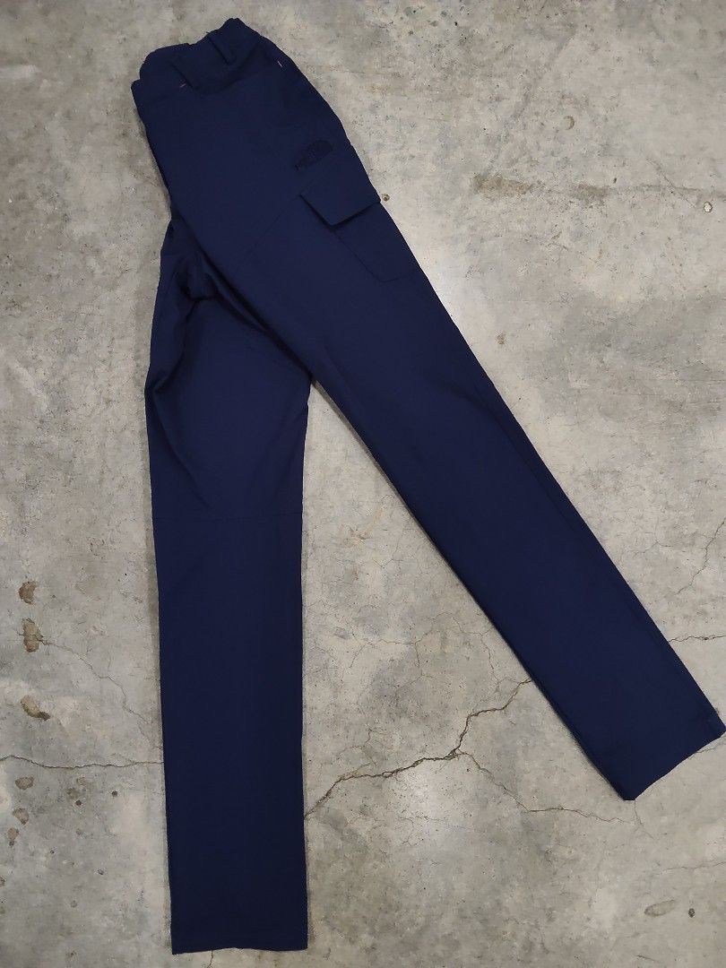 The North Face Blue Cargo Hiking Pants (Category: Activewear) located in Manila. Submitted by jepoy2026 (Listing ID 1469615563, Image 3). Description: - Brand: The North Face - Color: Navy Blue - Ideal for: Hiking and outdoor activities - Material: Lightweight, stretchy fabric - Pockets: Multiple side cargo pockets and a secure zippered back pocket.
