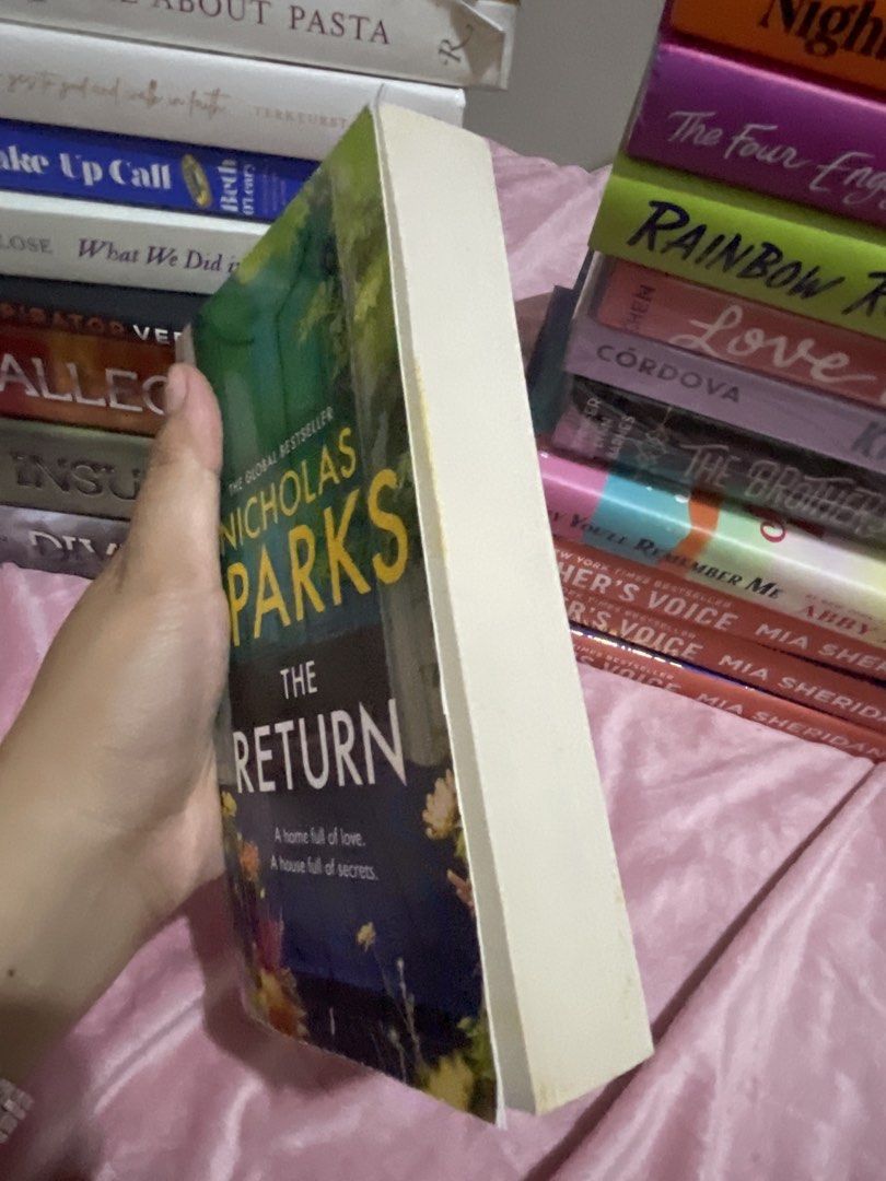 The Return by Nicholas Sparks Novel Paperback (Category: Storybooks) located in San Fabian. Submitted by chloejeanyzarate (Listing ID 1469700740, Image 3). Description: - Title & Author: The Return by Nicholas Sparks - Format: mmpb edition with colorful cover art - Plot: Follows Trevor Benson to North Carolina as he uncovers family secrets and mysteries - Condition: Readable pages with light shelf wear along the outer edges - Note: Includes origi