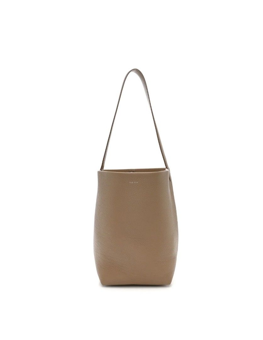 The Row Ns Park Tote Bag Medium Grained Leather (Category: Luxury Bags & Wallets) located in Baguio. Submitted by luxuryph2600_eric (Listing ID 1469594885, Image 1). Description: THE ROW Ns Park Tote Leather Bag DETAILS⬇️⬇️⬇️ 📌Rank A ( Excellent Condition) 📌Size Medium 📌Color Rate 10/10 💰💰💰PRICE: 3500 FREESHIP 🐲LOCATION : Baguio City PRICE is negotiable just Send me your OFFER Shipping via JnT BOX BAG RANKING GUIDE: RANK SA - Good as new, 