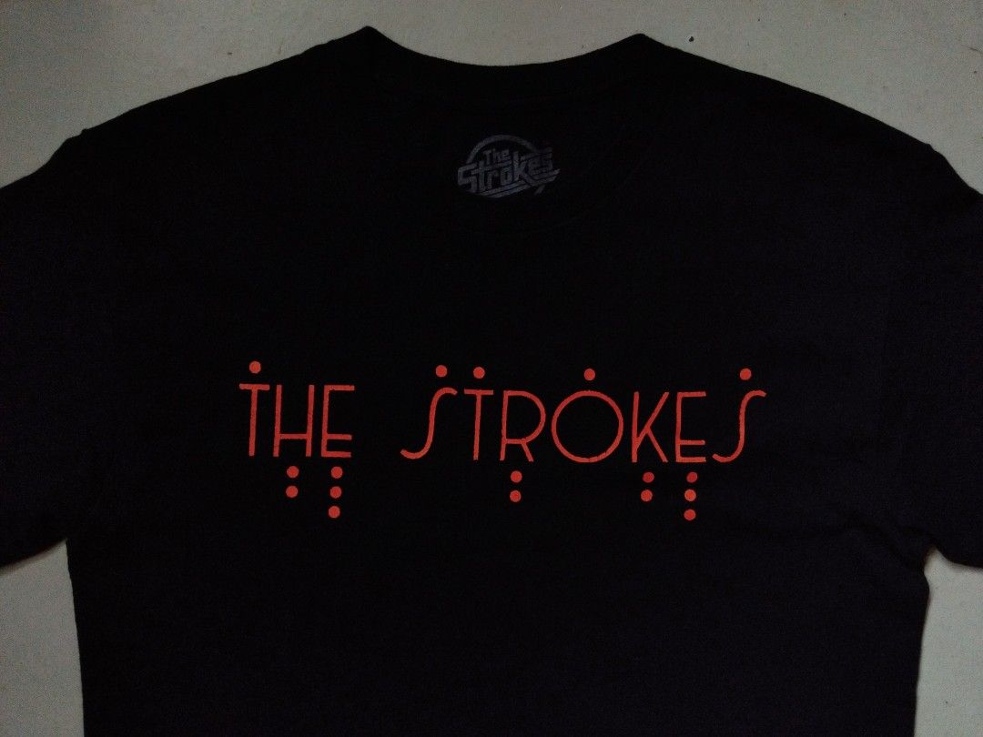 THE STROKES BANDSHIRT (Category: Tshirts & Polo Shirts ) located in Makati City. Submitted by KAMUSIKATAYO (Listing ID 1469592261, Image 1). Description: 20 x 28 VERY GOOD CONDITION.