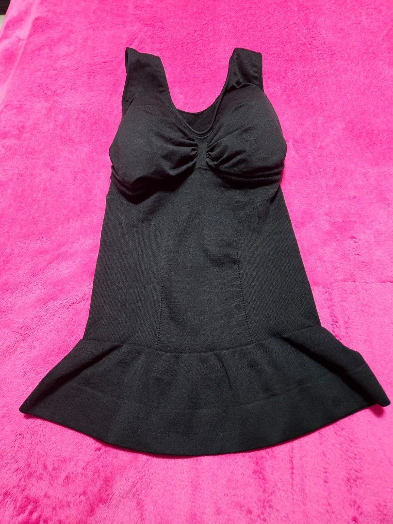 Thin Lizzy Miracle Slimming Cami (Category: Undergarments & Loungewear) located in Caloocan City. Submitted by rm.diaz (Listing ID 1469655007, Image 1). Description: Black Slimming Shapewear - 3 in 1 shapewear garment that functions as a push-up bra, camisole, and an abdominal tummy control - Features a wireless support and a compression panel designed to smooth the middle section - Eliminates back rolls and muffin tops - Care Instructions: Machi